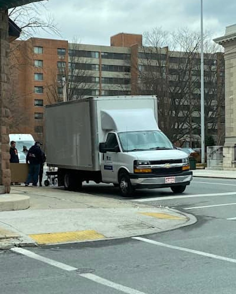 OneMove moving truck on a city street